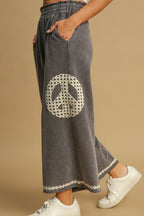 Umgee Full Size Peace Lace Applique Mineral Wash Wide Leg Pants Plus Size